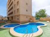 Sunrise views and Mediterranean breezes in Nueva Torrevieja! 2 bedrooms + communal pool