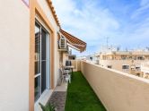 Stunning renovated three-bedroom corner penthouse in the Santa Gema residential complex.