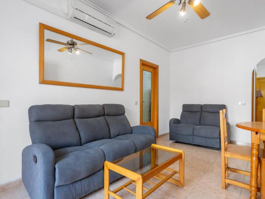 Espanha Ground floor apartment with 2 bedrooms, patio, pool and tourist license, 850 meters from Playa de la Acequión