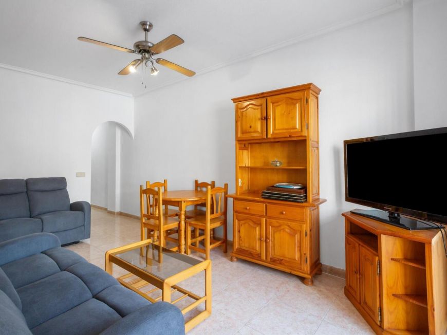 Espanha Ground floor apartment with 2 bedrooms, patio, pool and tourist license, 850 meters from Playa de la Acequión