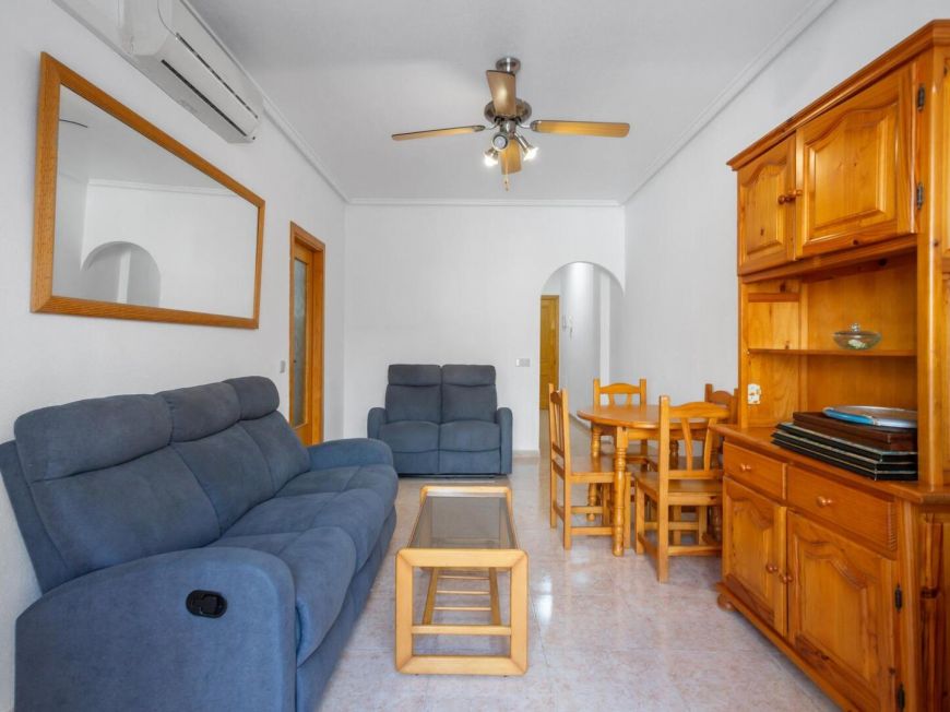 Espanha Ground floor apartment with 2 bedrooms, patio, pool and tourist license, 850 meters from Playa de la Acequión