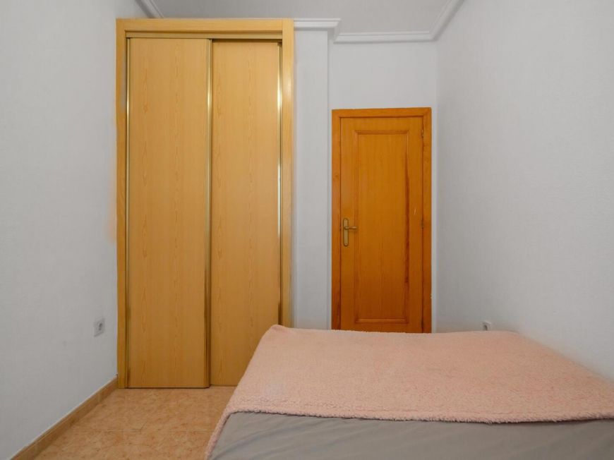 Espanha Ground floor apartment with 2 bedrooms, patio, pool and tourist license, 850 meters from Playa de la Acequión