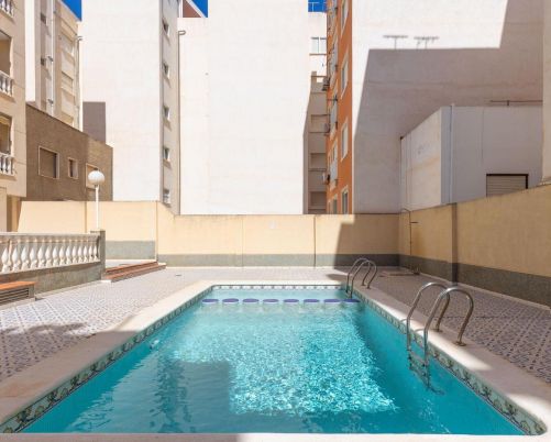 Cozy Ground Floor Apartment with Communal Pool!!